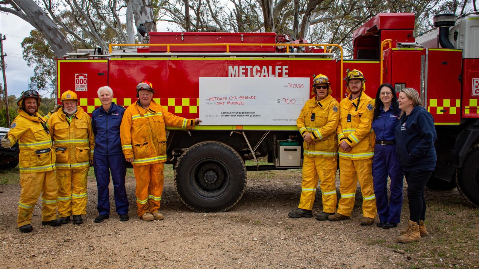 Metcalfe brigade members receiving their donation